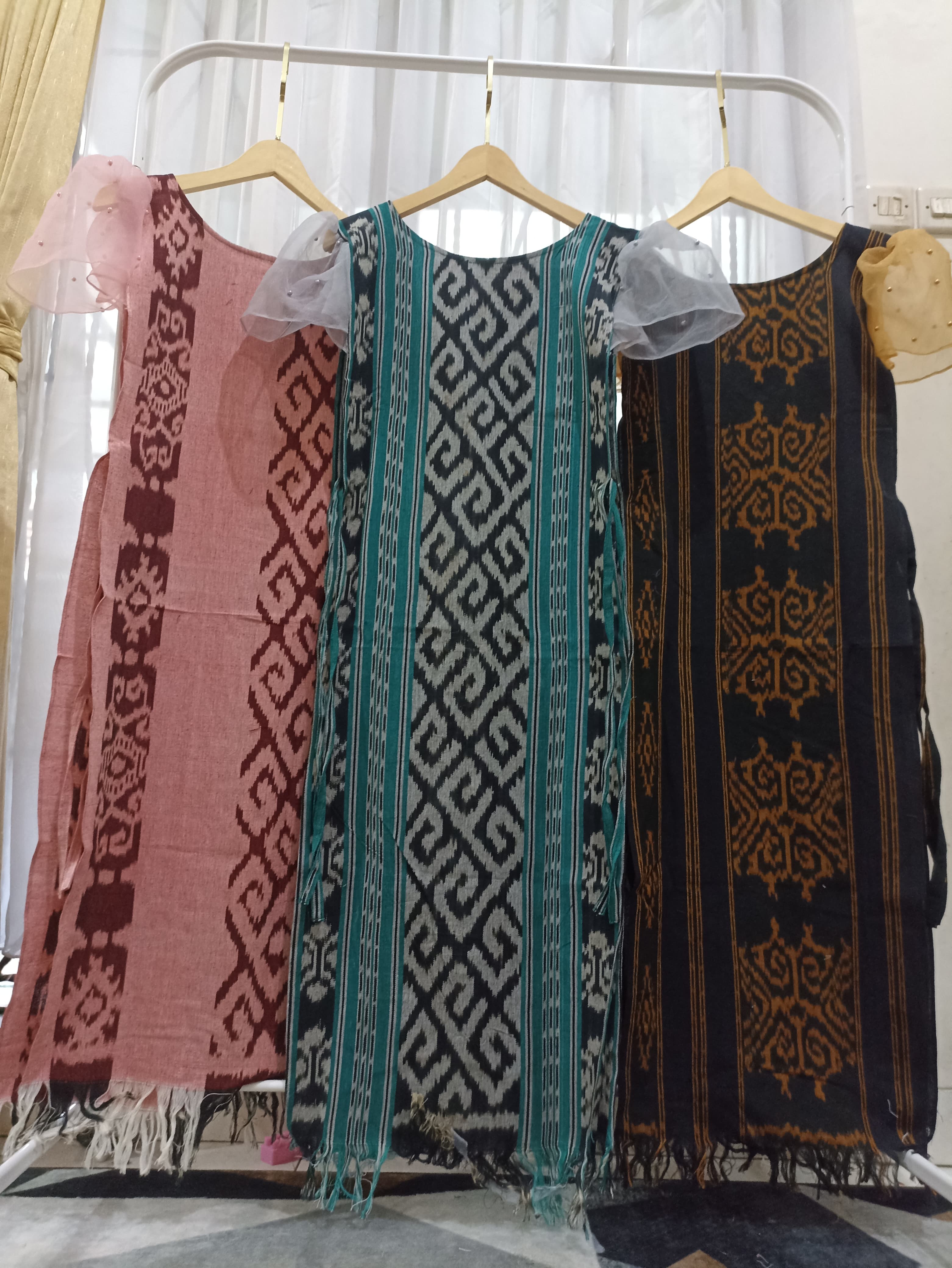 Tenun raya